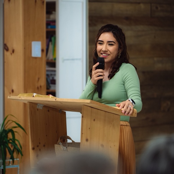 Pastor Tiffany preaching at Victory Faith Church